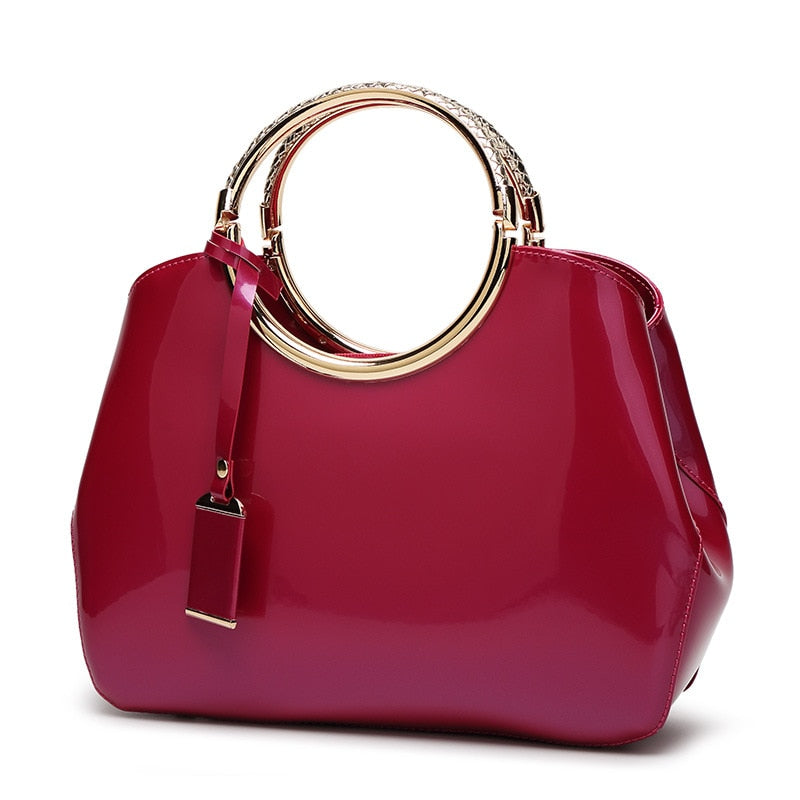 Bolso cruzado de charol para mujer