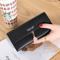 Cartera larga de cuero sintético para mujer