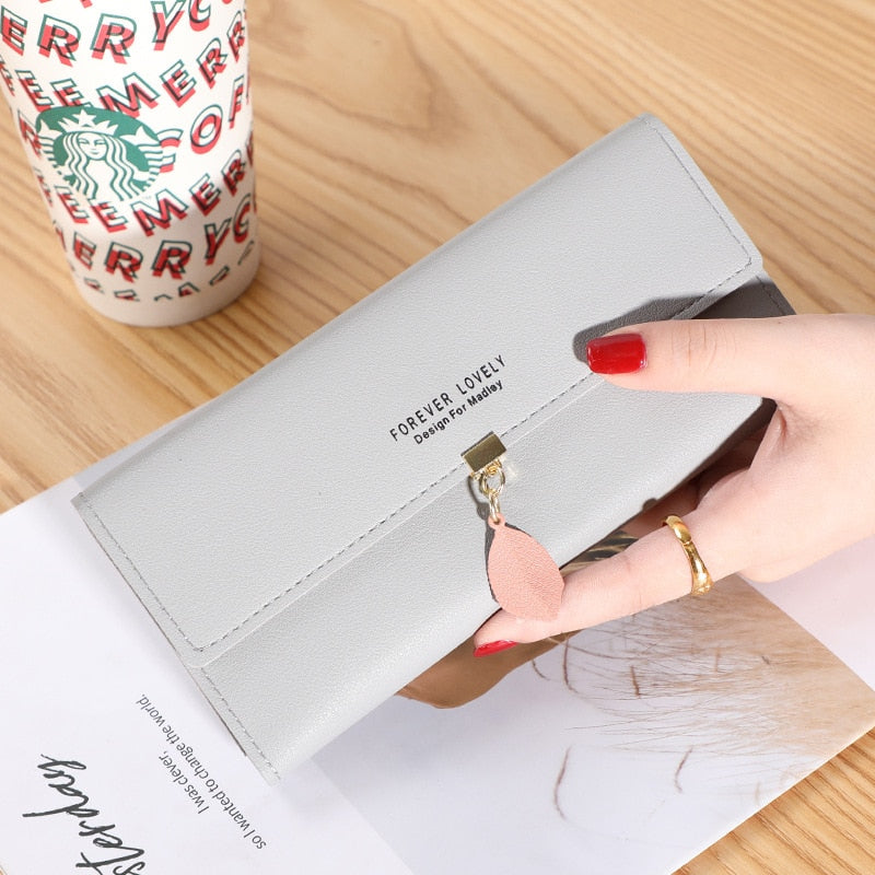 Cartera larga de cuero sintético para mujer